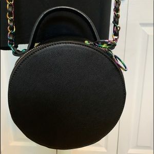 Black round cross body
